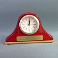 This is a image of a high polish piano finish shelf clock with a gold engraved plate and when selected it will take the visitor to a gift items home page