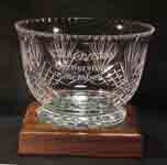 Image of a cut crystal bowl on a walnut base