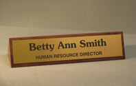 Image of walnut desk name block